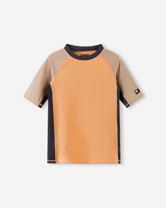 Front view of the Reima Uiva kids' UPF 50+ sunproof rash guard in apricot, showcasing a contrasting beige short sleeve and dark grey side panel design made with breathable, UV-protective swimwear fabric.