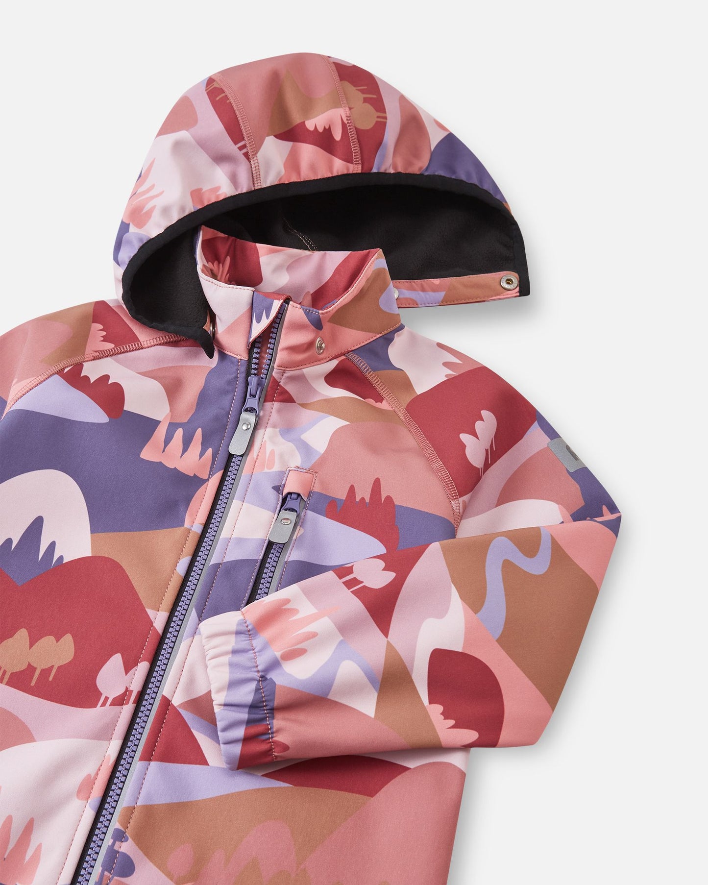 Close-up of the hood and high collar on the rose blush Reima Vantti kids' softshell jacket, highlighting the cozy, insulating black fleece lining designed for cold-weather protection.