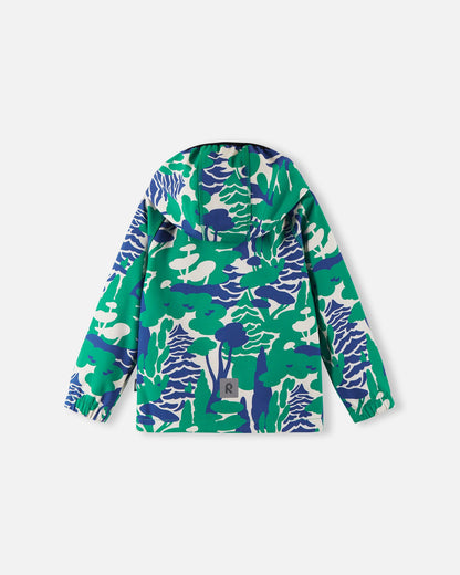 Back view of the green forest print Reima Vantti kids' softshell jacket, showcasing the lively woodland pattern, a comfortable active fit, and a highly visible reflective safety patch at the lower hem.
