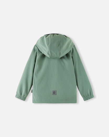 Back view of the stone green Reima Vantti kids' softshell jacket, showcasing a comfortable raglan sleeve design, a protective hood, and a highly visible reflective safety patch at the lower hem.