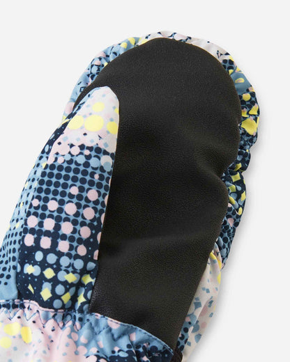 Close-up detail of the black reinforced palm and thumb material on the frozen blue Reima Vanukko kids' ski mittens, engineered for maximum durability and physical dexterity in the snow.