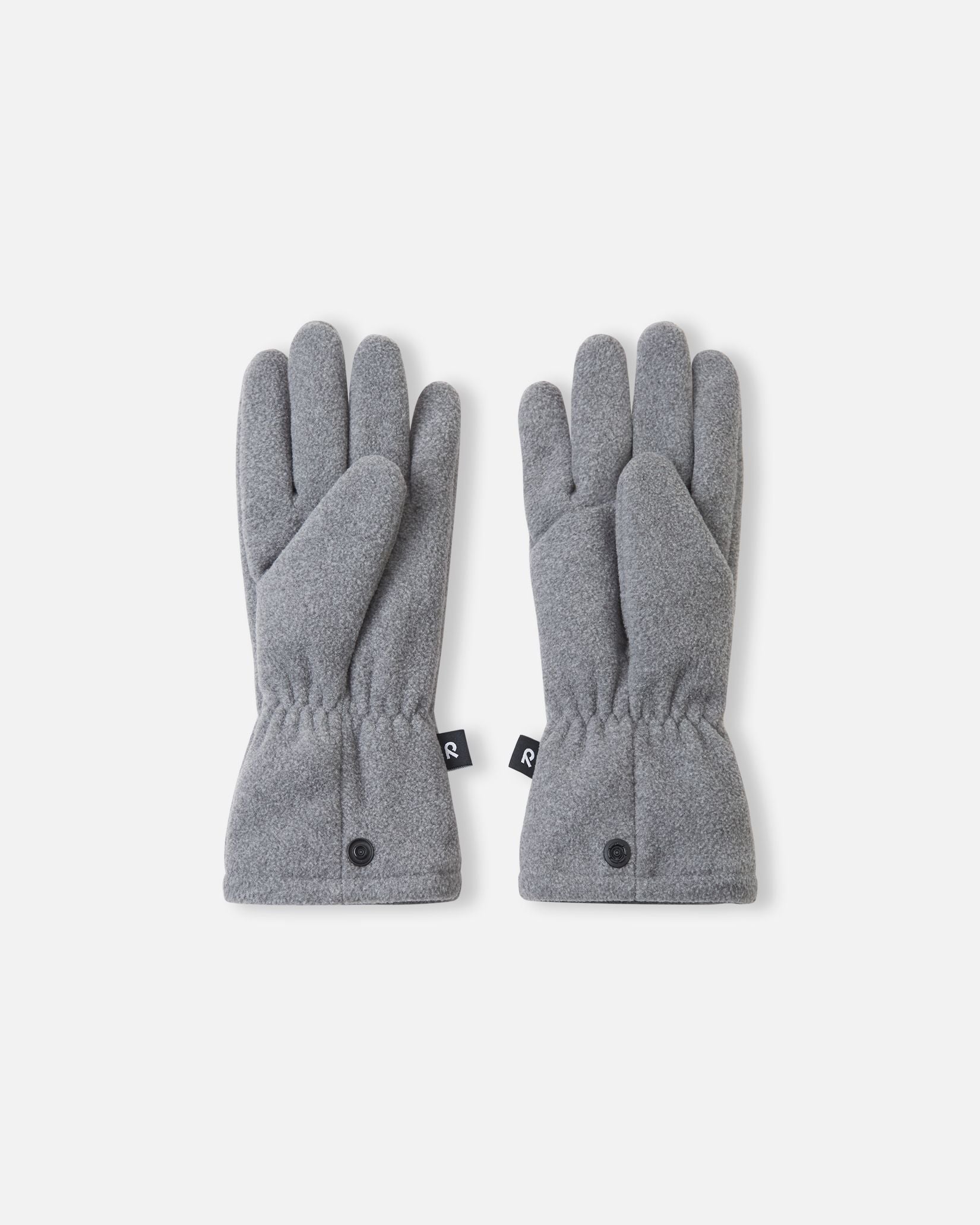 Palm side view of the Reima Varmin children's fleece gloves in a light melange grey, featuring a classic five-finger design, gathered elastic wrists to keep out cold air, and connecting snap buttons at the bottom hem.