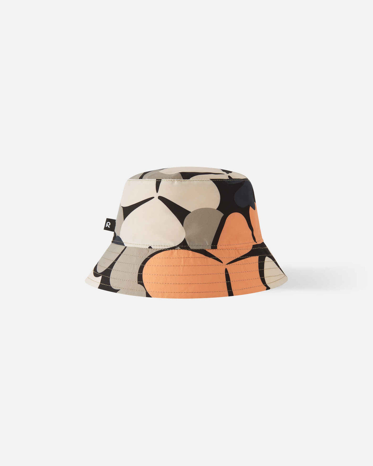 Back view of the apricot Reima Viehe kids' reversible sun hat, highlighting the protective wide brim and stylish floral clover pattern designed for safe outdoor summer play.