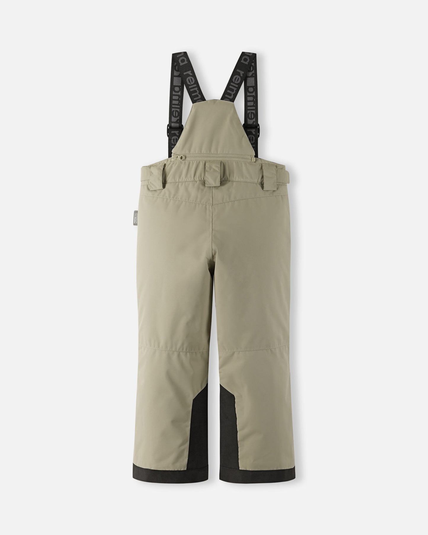 Back flat lay view of the earthy beige Reima Wingon kids' ski pants, showcasing the high-back coverage, elastic waistband, and heavy-duty black reinforced lower legs built for rugged winter sports.